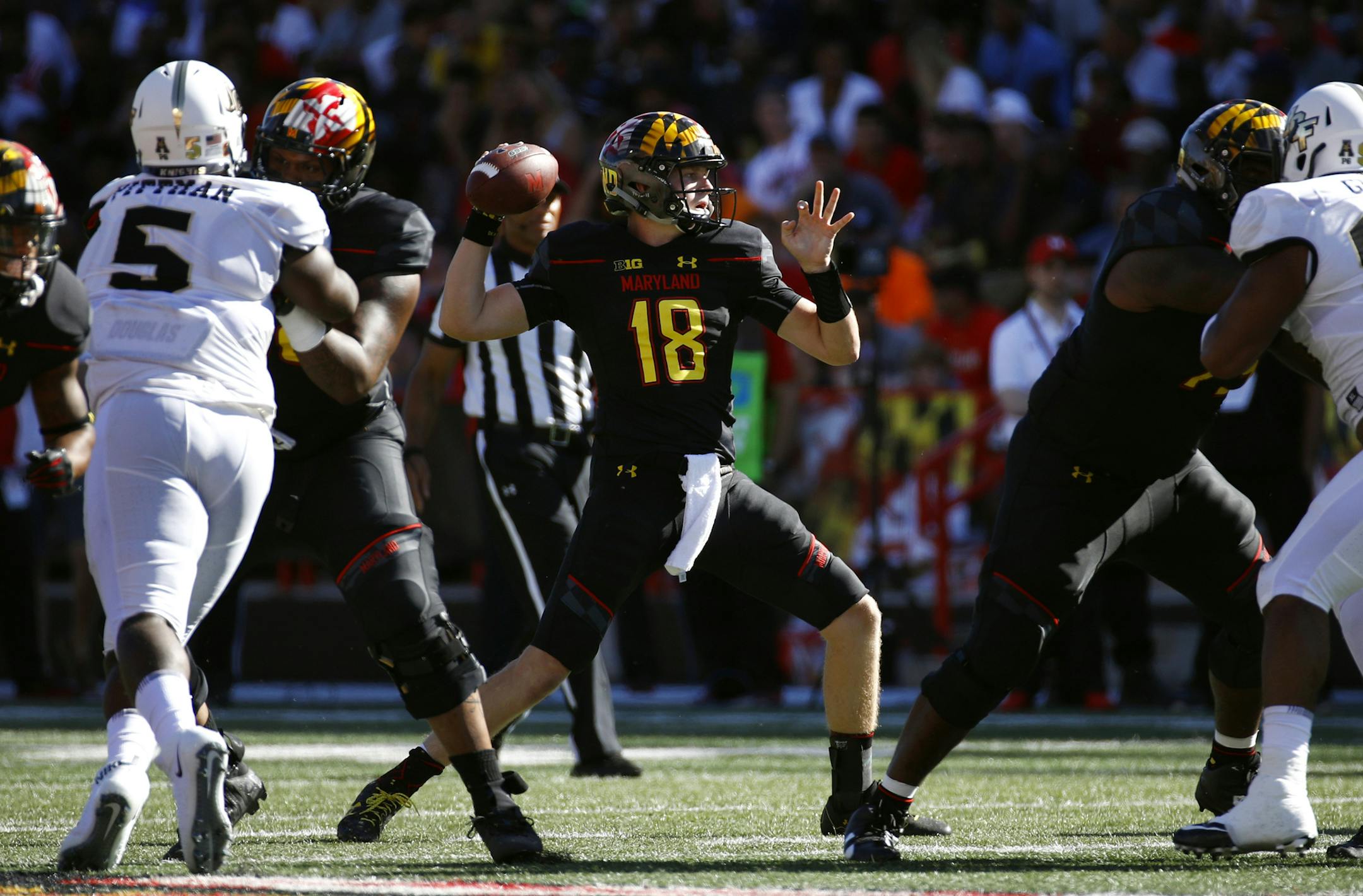 Maryland quarterback Max Bortenschlager (18) throws to a receiver in the first half of an NCAA college football game against Central Florida in College Park, Md., Saturday, Sept. 23, 2017. (AP Photo/Patrick Semansky) ORG XMIT: MIN2017092611544424