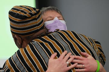 Kelly Maynard met William “Henry” Byrd, the recipient of the kidney she donated, at a 60th anniversary celebration of HCMC’s first kidney transp