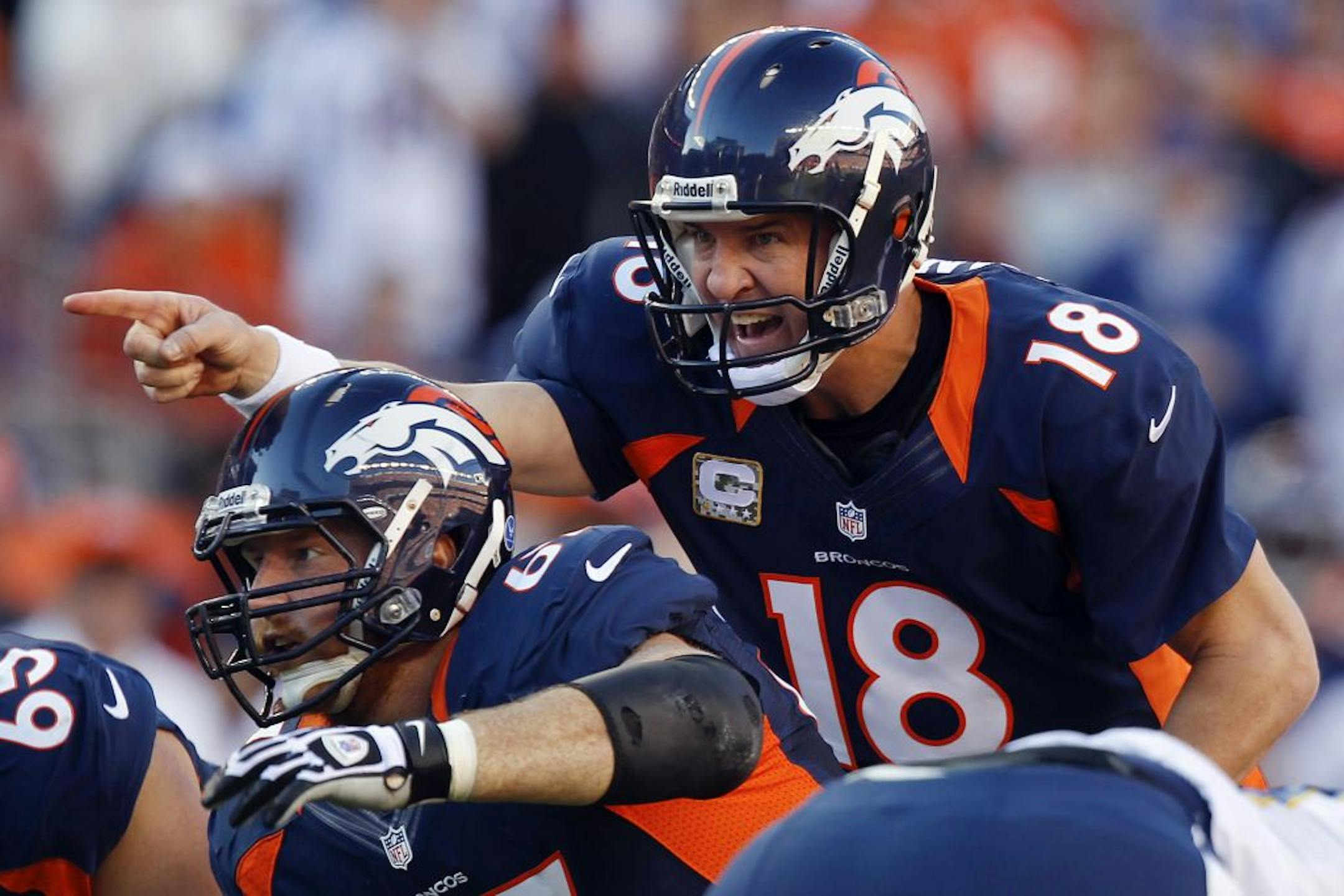 In this Nov. 18, 2012, file photo, Denver Broncos quarterback Peyton Manning calls an audible against the San Diego Chargers.