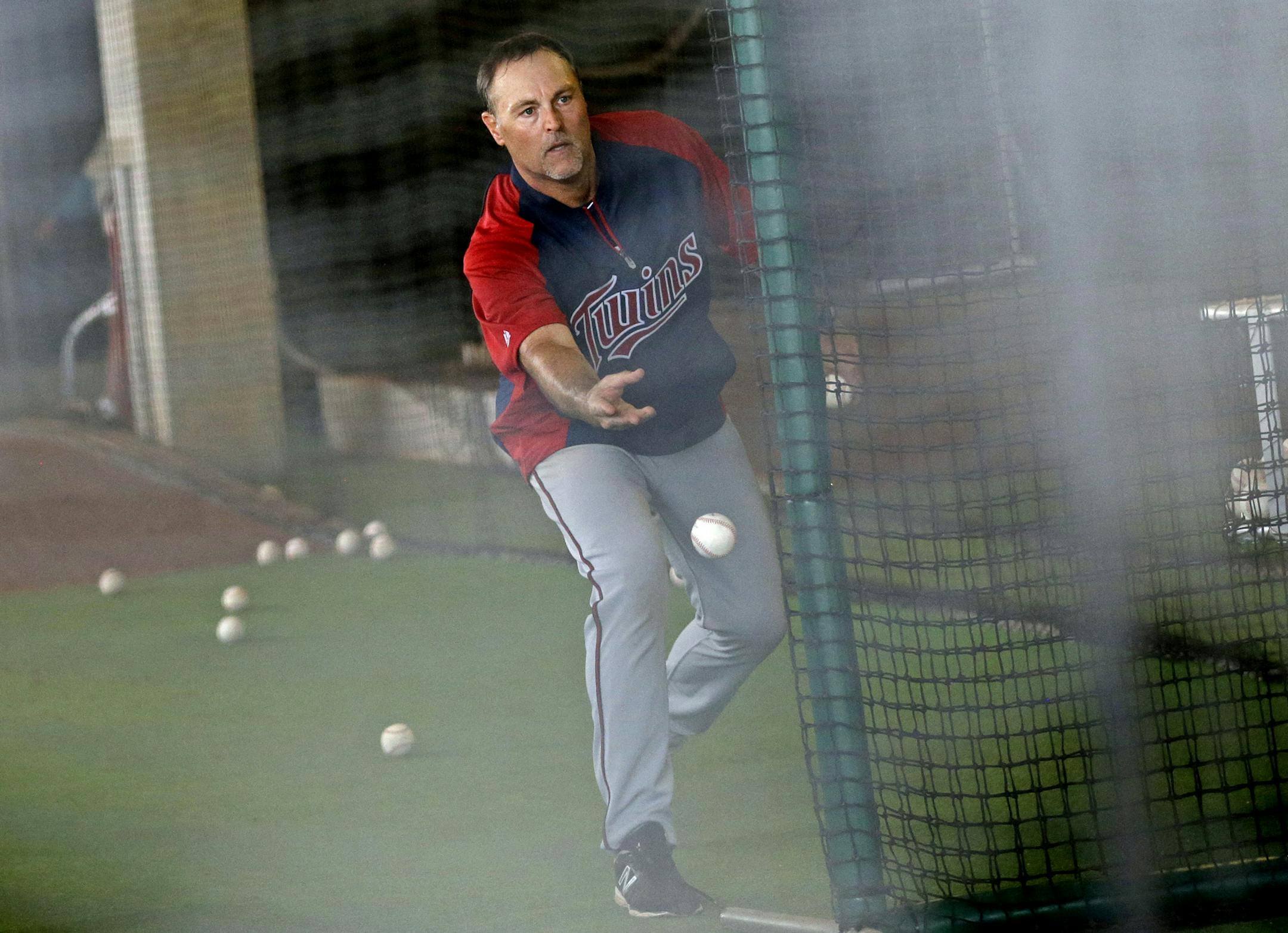 Twins hitting coach Tom Brunansky tossed baseballs to players during practiceThursday Feb.21, 2013 at Lee County Sports Complex in Fort Myers, FL.] JERRY HOLT &#x2022; jerry.holt@startribune.com
