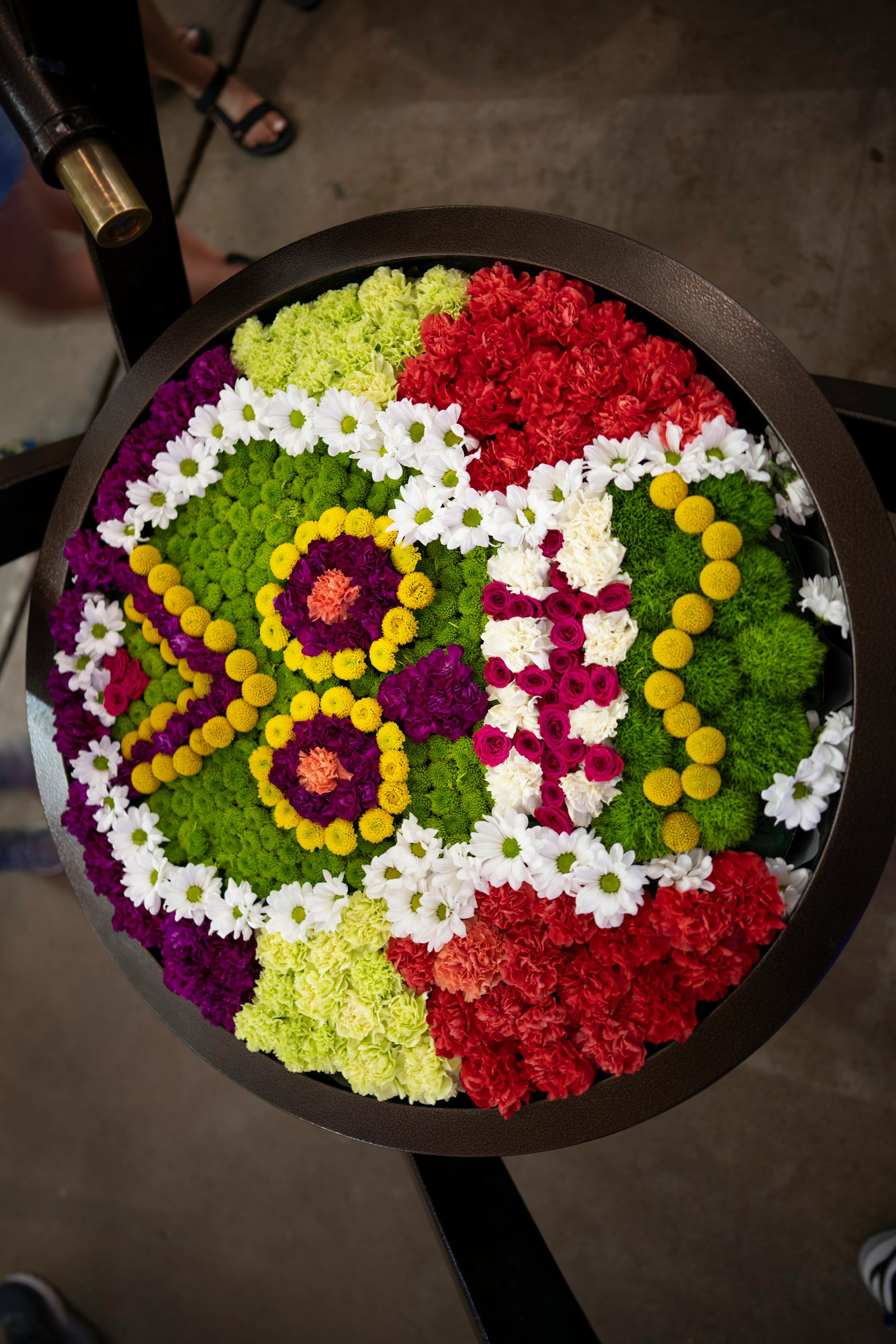 A spinning arrangement of fresh cut flowers in the Agriculture Building on the first day of the Minnesota State Fair.