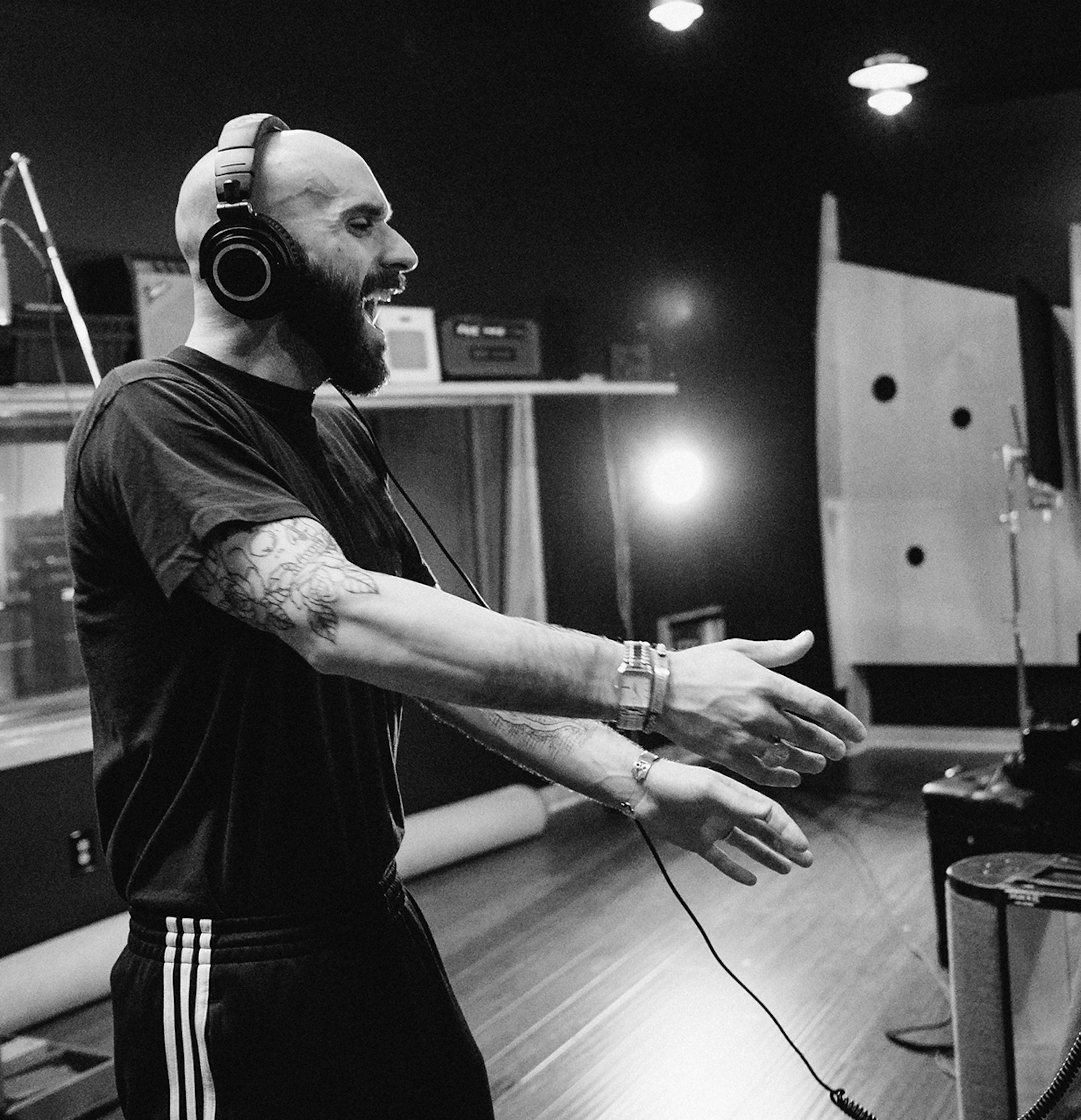 X Ambassadors' Sam Harris recorded vocals for "Symphony for Our World."