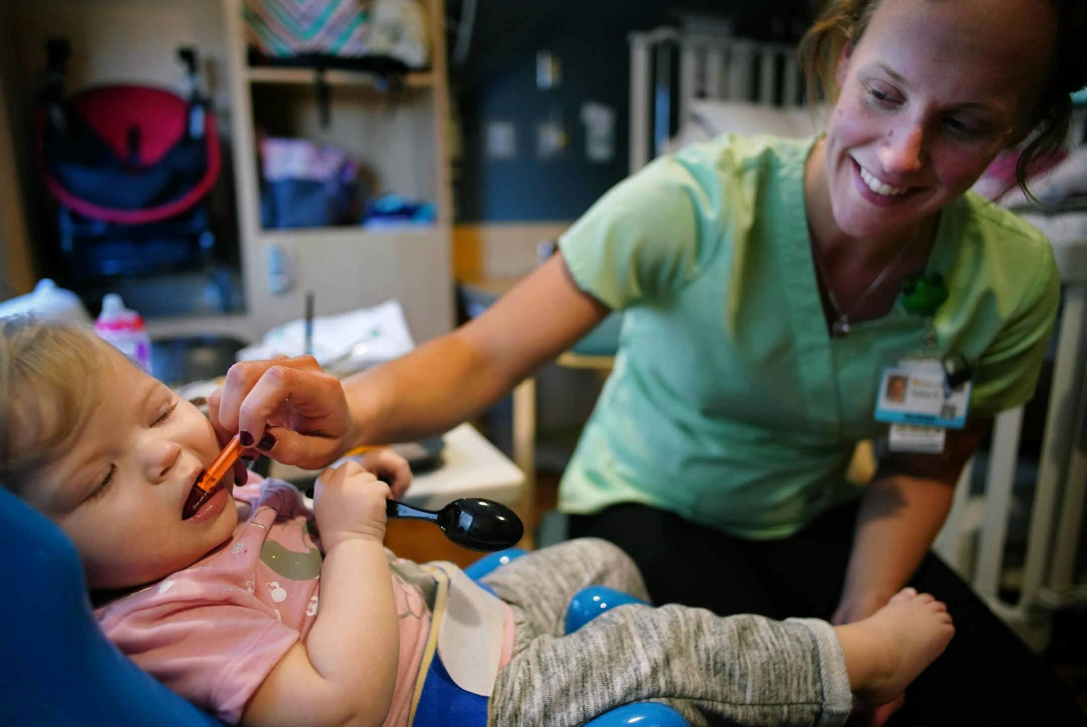 Registered nurse Kelsey Sorensen gives Aria some gabapentin which is used to treat multiple sclerosis.