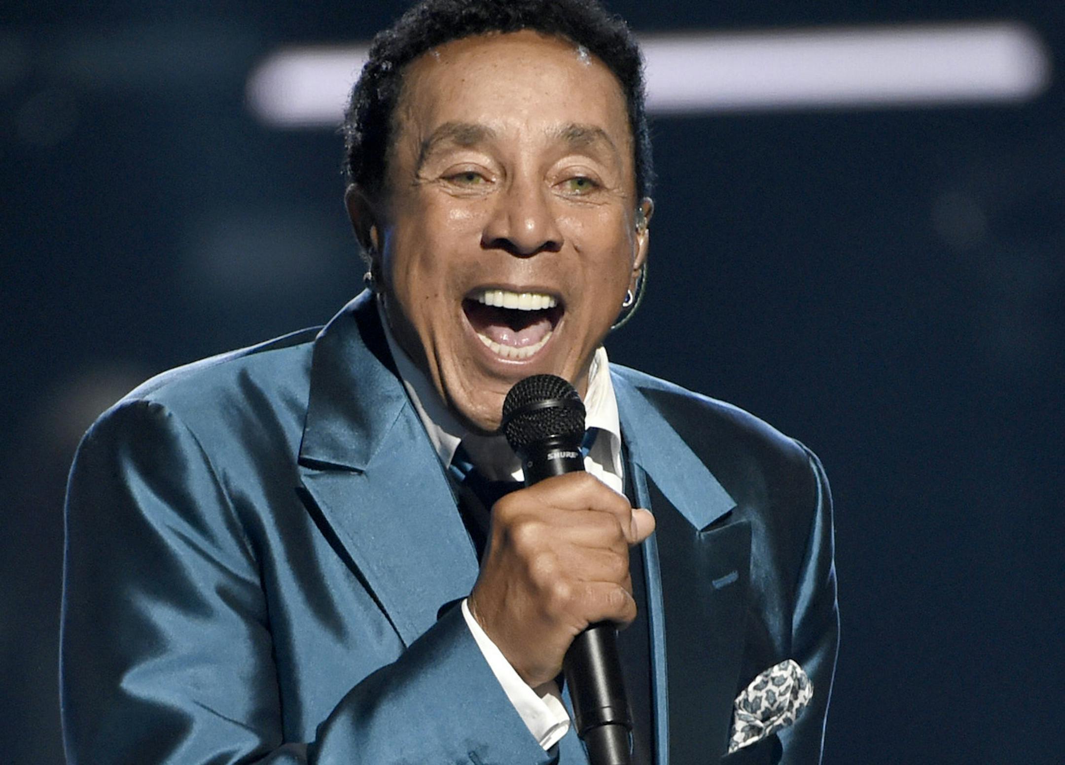 FILE - In this June 28, 2015, file photo, Smokey Robinson performs at the BET Awards in Los Angeles. Robinson has been honored by the Library of Congress with the Gershwin Prize for Popular Song. The national library announced Tuesday, July 5, 2016, that Robinson will receive the award this year. (Photo by Chris Pizzello/Invision/AP, File)