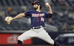 Minnesota Twins center fielder Ryan LaMarre (24) winds up during the eighth inning of a baseball game against the New York Yankees in New York, Monday