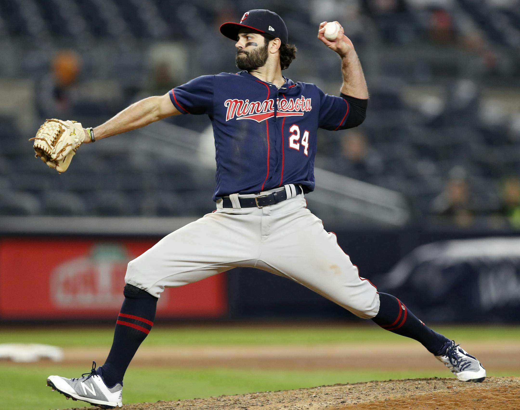 Minnesota Twins center fielder Ryan LaMarre (24) winds up during the eighth inning of a baseball game against the New York Yankees in New York, Monday, April 23, 2018. (AP Photo/Kathy Willens)