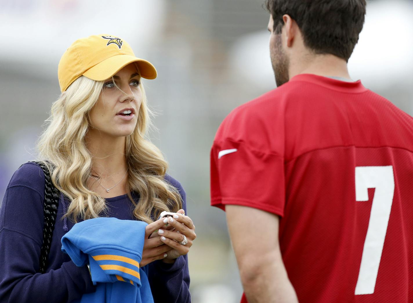 Minnesota Vikings quarterback Christian Ponder (7) spoke with wife Samantha Ponder after a practice at training camp. ] CARLOS GONZALEZ cgonzalez@startribune.com July 27, 2013, Minnesota Vikings Training Camp, Mankato, Minn., Minnesota State University, Mankato -