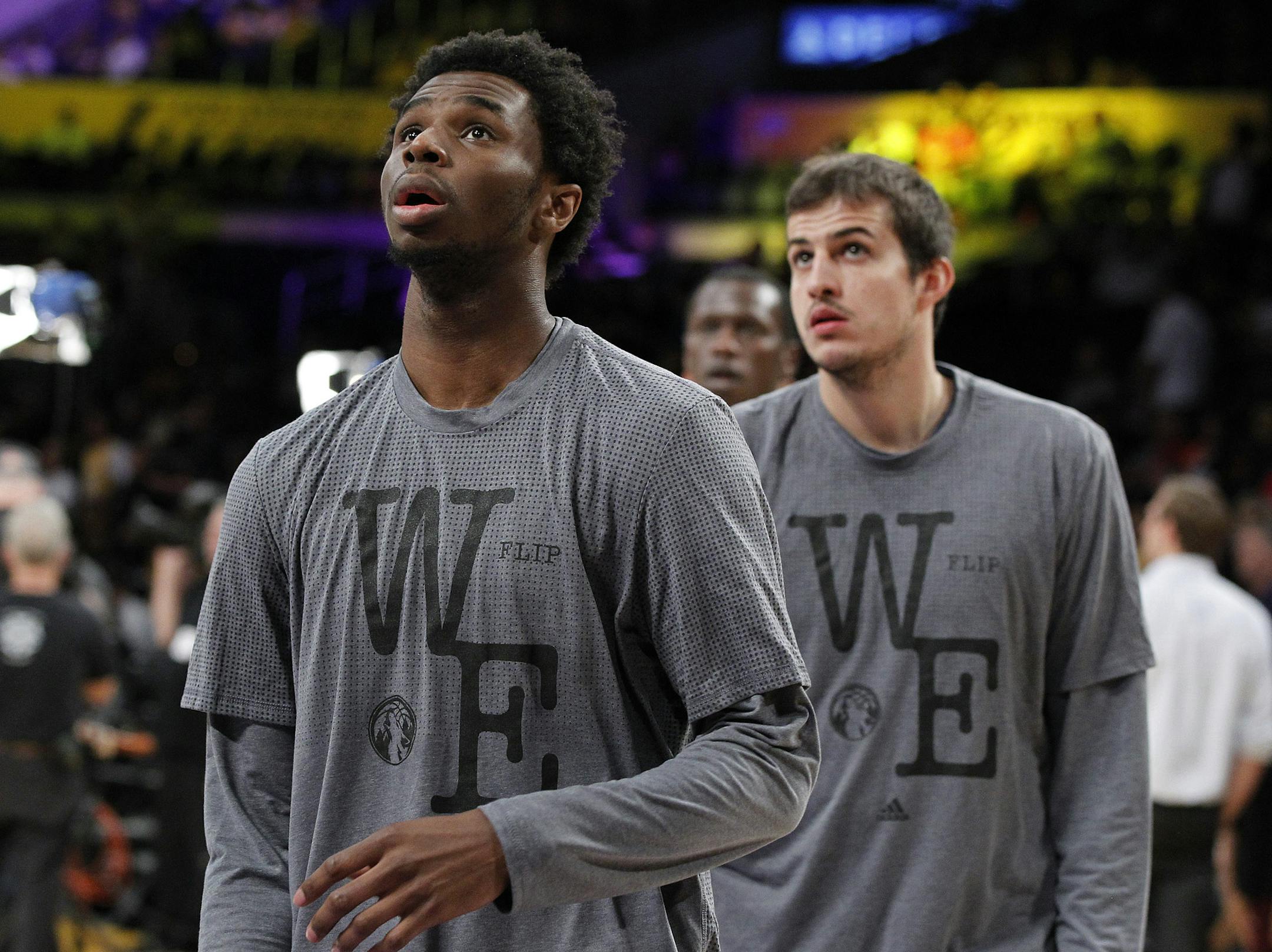 Minnesota Timberwolves forward Andrew Wiggins (22) looks up during warmups before an NBA basketball game against the Los Angeles Lakers in Los Angeles, Wednesday, Oct. 28, 2015.