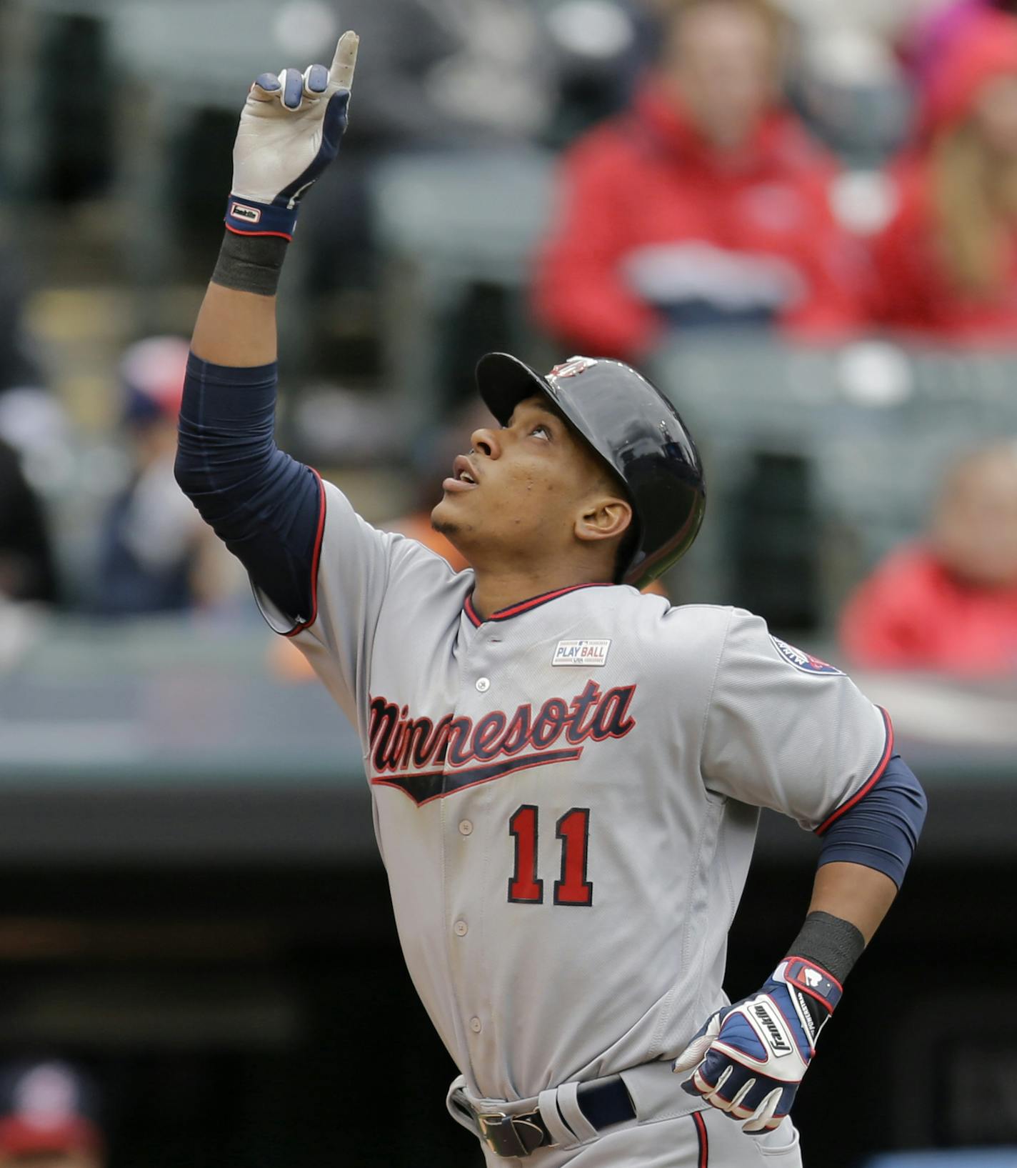 Minnesota Twins' Jorge Polanco points up after hitting a solo home run off Cleveland Indians starting pitcher Trevor Bauer in the sixth inning of a baseball game, Sunday, May 15, 2016, in Cleveland. (AP Photo/Tony Dejak)