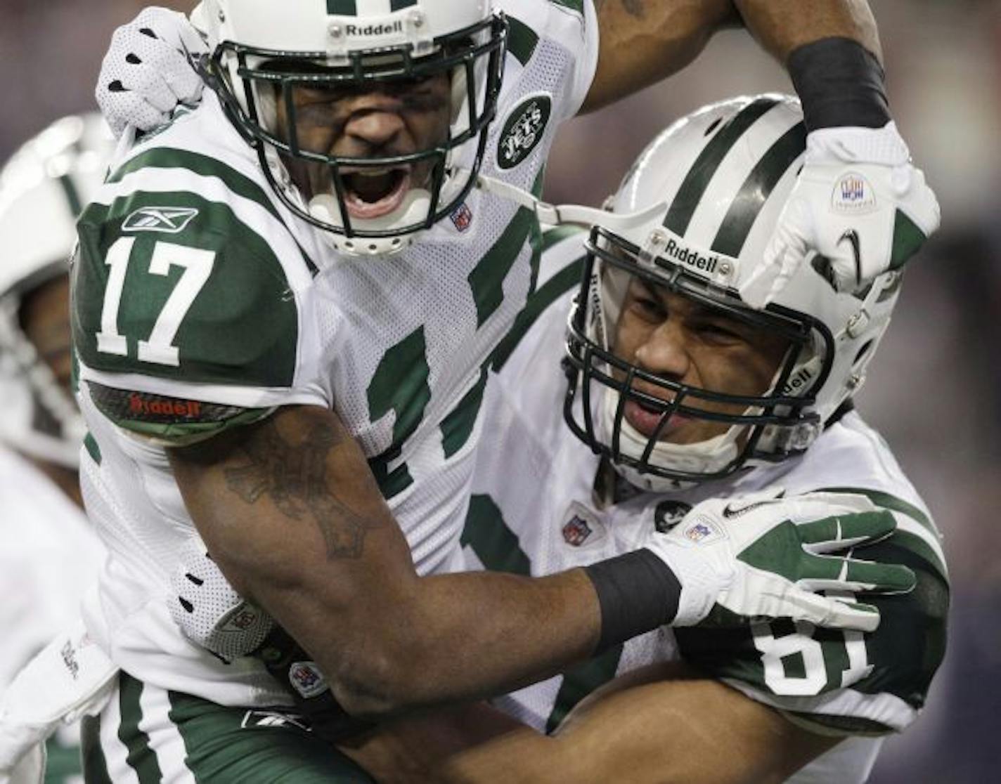 New York Jets wide receiver Braylon Edwards (17) celebrates his touchdown with tight end Dustin Keller, right, during the first half of an NFL divisional playoff football game against the New England Patriots in Foxborough, Mass., Sunday, Jan. 16, 2011.