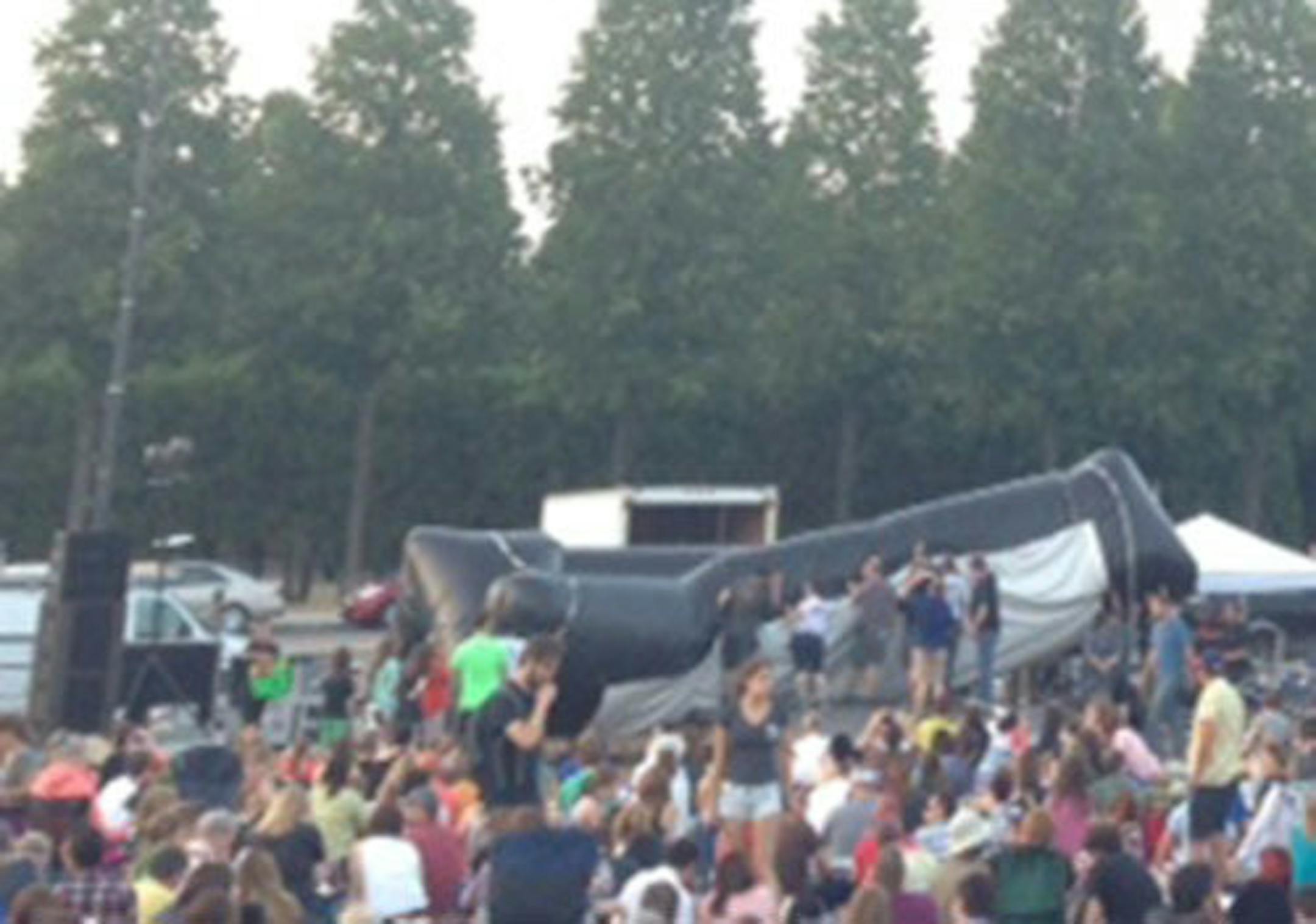 Volunteers worked to right the screen Thursday night at the Internet Cat Video Festival.