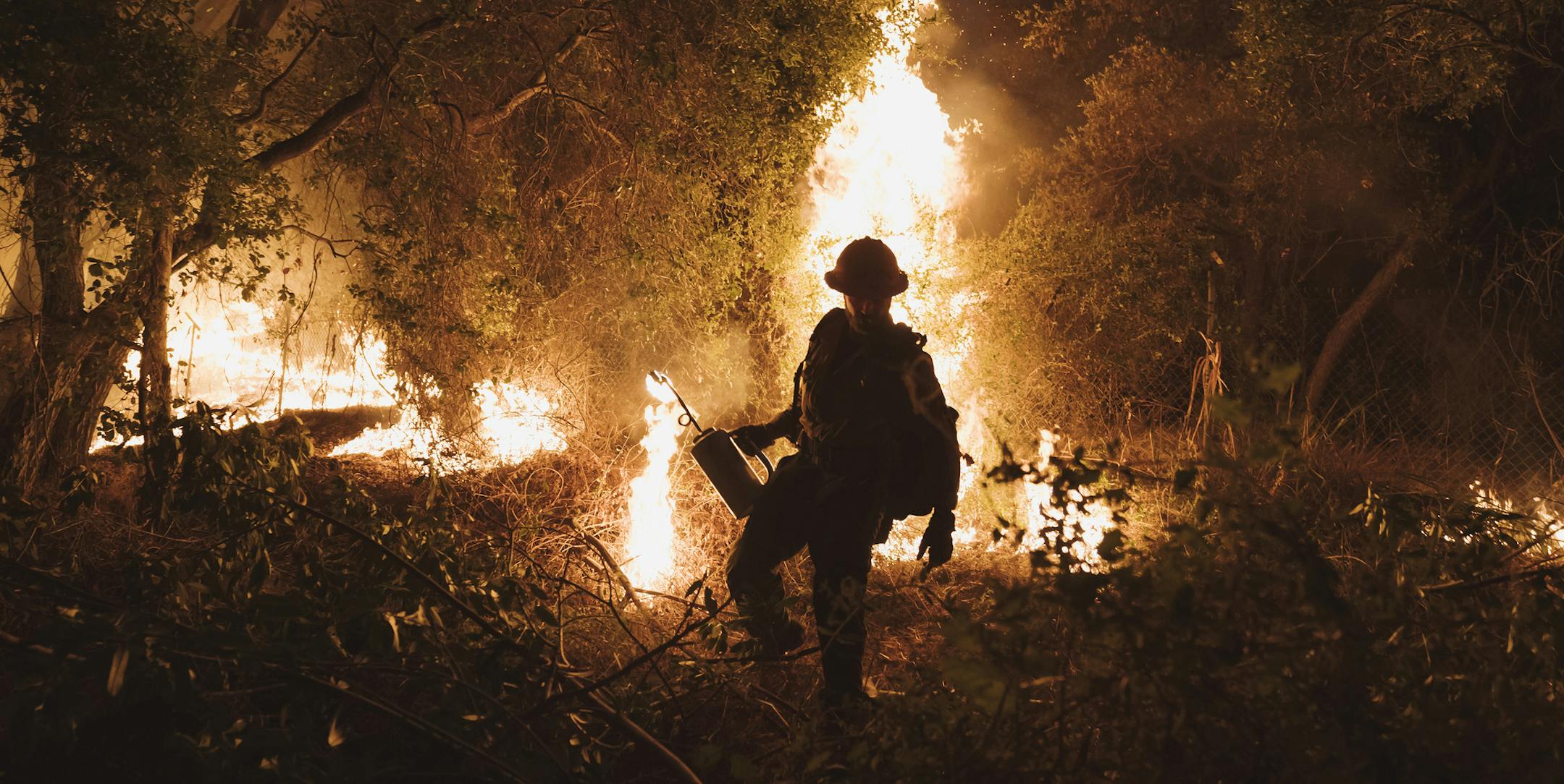Firefighters light backfires at the Bobcat Fire at Santa Anita Canyon in Arcadia, Calif., Sunday, Sept., 13, 2020. Wildfires across the West Coast have consumed roughly five million acres of land in California and Oregon and destroyed entire towns in Washington, and they continued to spread on Sunday. (Eric Thayer/The New York Times)