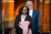 Sharon Ross, who ran the St. Paul nonprofit House of Refuge, walked out of U.S. District Court on Wednesday with her attorney Earl Gray. Ross changed 