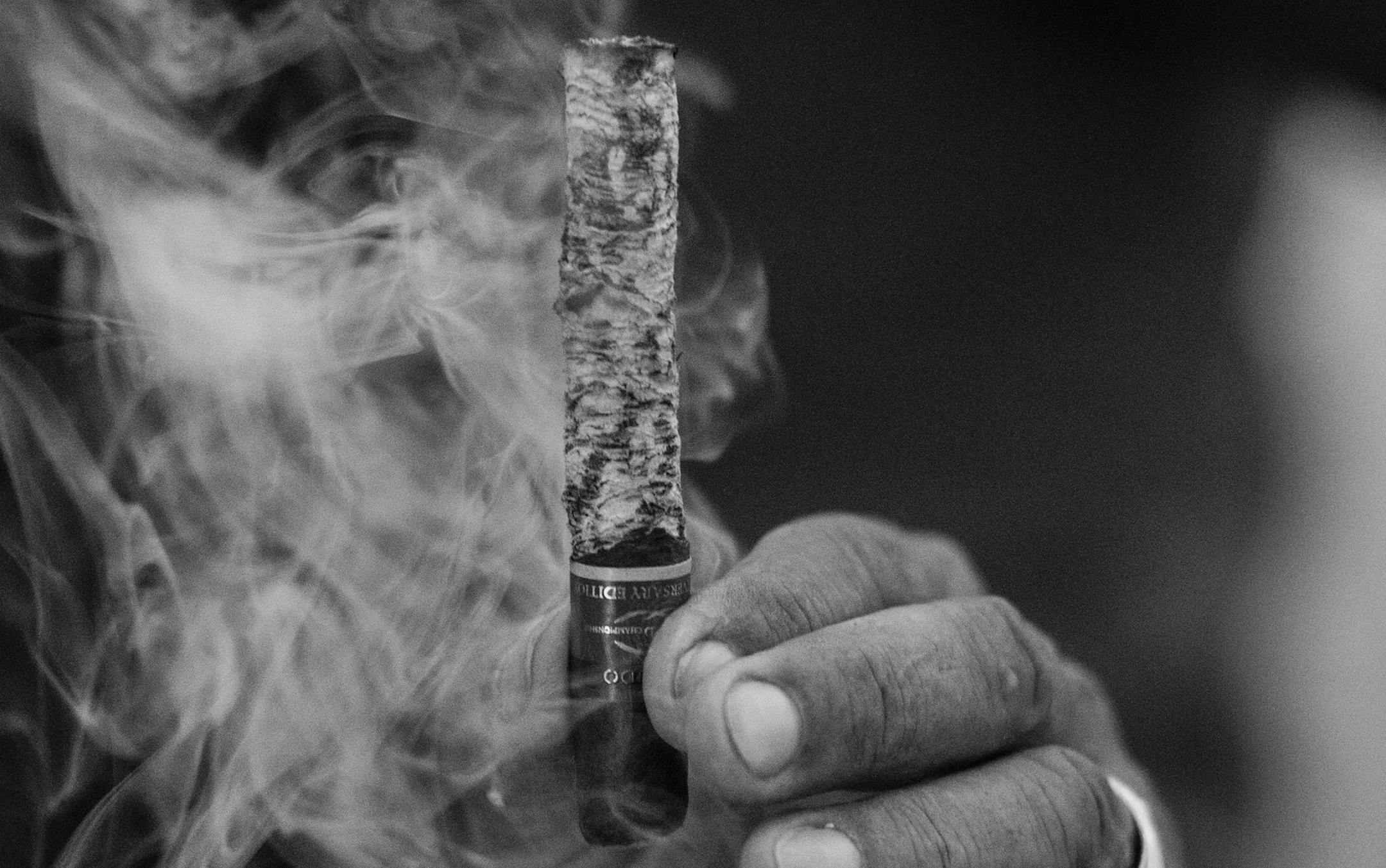 **EMBARGO: No electronic distribution, Web posting or street sales before 3:01 a.m. ET Tuesday, Oct. 29, 2019. No exceptions for any reasons. EMBARGO set by source.** Ivan Mazuranic holds his cigar as he competes in the 10th Cigar Smoking World Championship in Split, Croatia, on Aug. 31, 2019. A trip to the championship confirms that competition, regardless of the discipline and the contestants, remains just a state of mind. (Pete Kiehart/The New York Times)