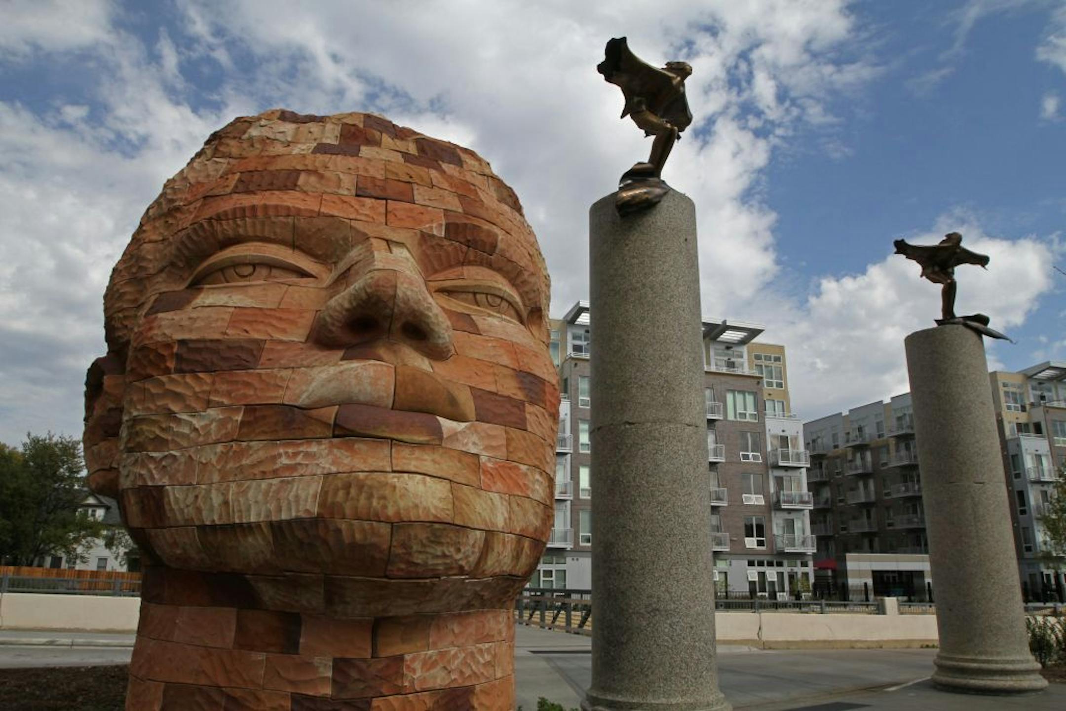 Statues at the Mozaic plaza in the Uptown area of Minneapolis.