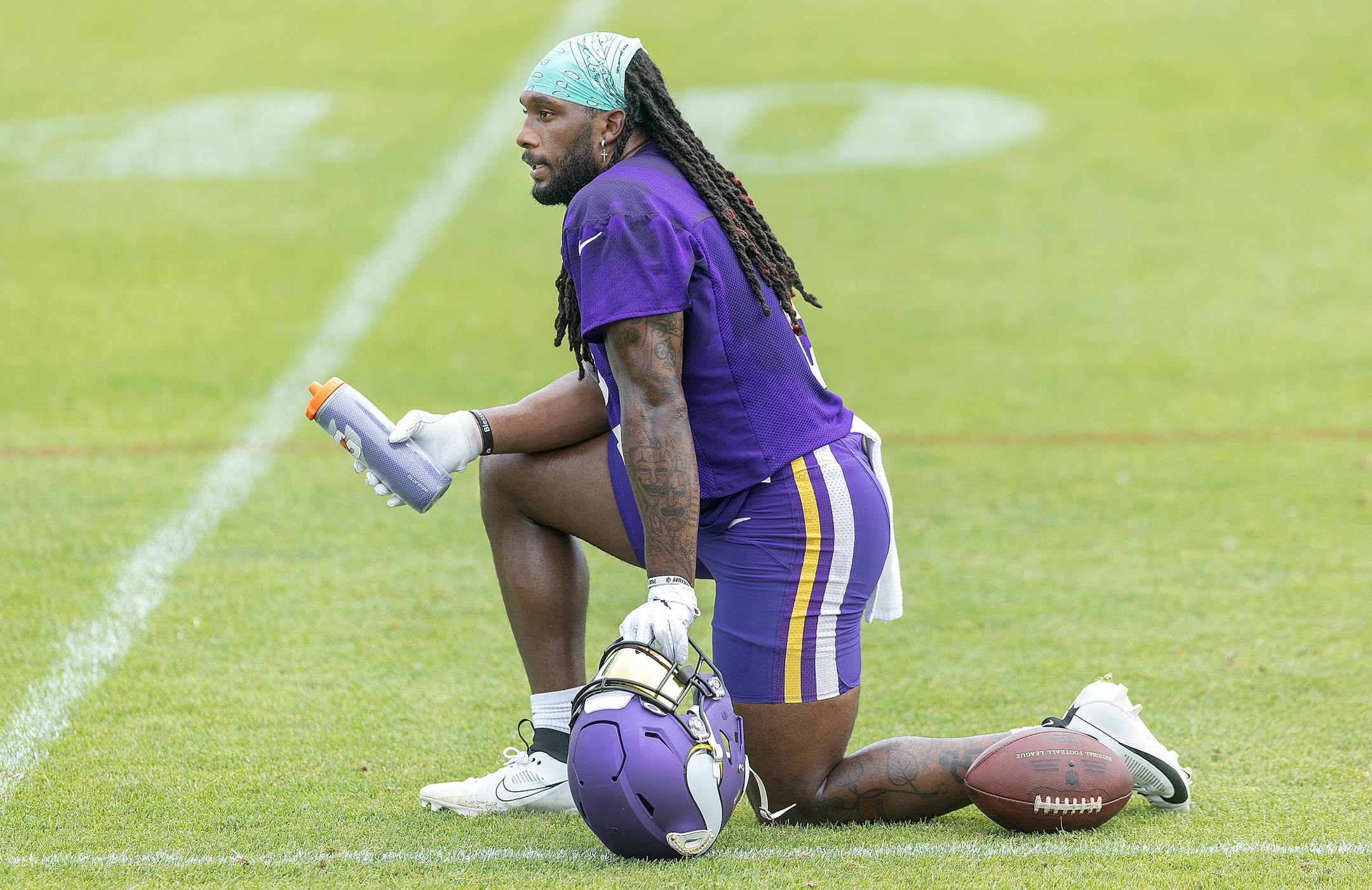 Vikings running back Alexander Mattison takes a breather during practice at the TCO Performance Center in Eagan, Minn., on Tuesday, June 6, 2023.