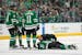 Dallas’ Radek Faksa lay on the ice after colliding with the Wild’s Marcus Foligno in the first period Tuesday. Foligno was assessed a five-minute 