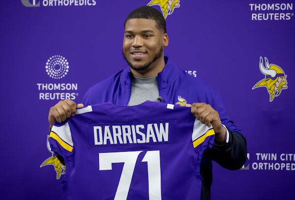 Vikings’ first-round draft pick Christian Darrisaw from Virginia Tech was all smiles Friday as he was introduced with the No. 71 at TCO Performance 