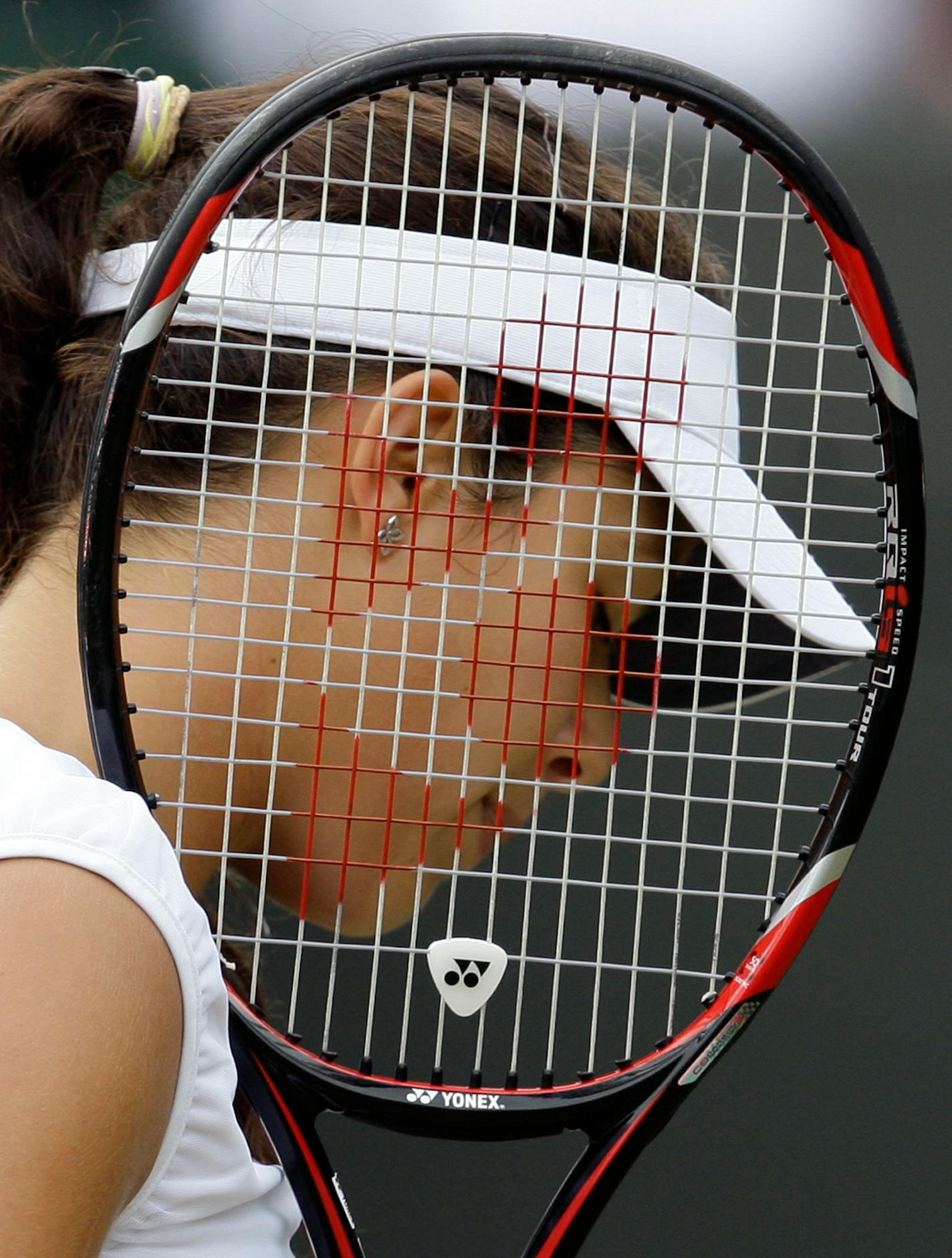 Ana Ivanovic of Serbia reacts during her match against Zheng Jie of China, at Wimbledon, Friday, June, 27, 2008.