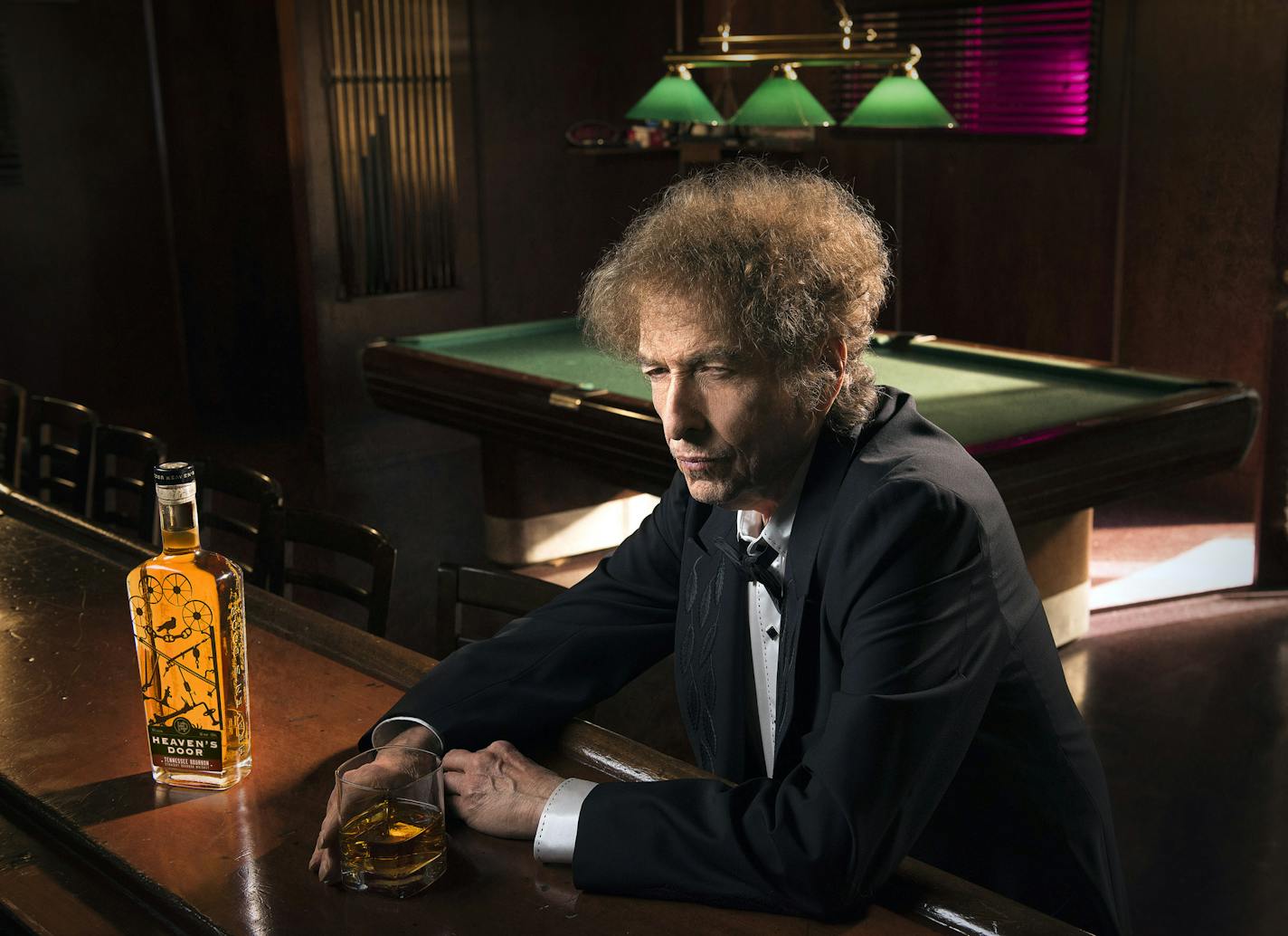 -- PHOTO MOVED IN ADVANCE AND NOT FOR USE - ONLINE OR IN PRINT - BEFORE APRIL 29, 2018 -- Bob Dylan in a promotional photo for his Heaven&#x2019;s Door whiskey, which is to be introduced in May 2018. Dylan&#x2019;s entry into the booming celebrity-branded spirits market is the latest career twist for an artist who has spent five decades confounding expectations. (John Shearer via The New York Times) -- NO SALES; FOR EDITORIAL USE ONLY WITH NYT STORY SLUGGED DYLAN WHISKEY BY BEN SISARIO FOR APRIL