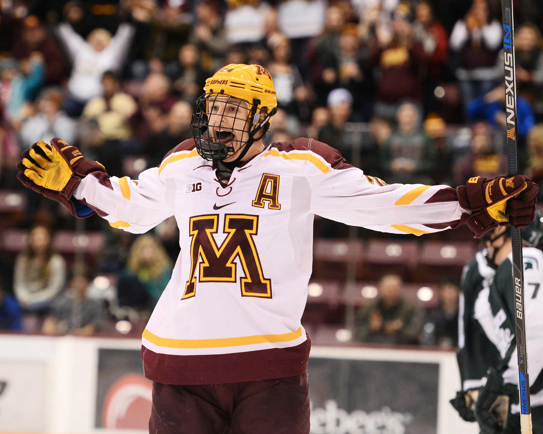 Minnesota Golden Gophers right wing Hudson Fasching (24) celebrated after scoring a goal on the Michigan State Spartans in the third period. ] (AARON LAVINSKY/STAR TRIBUNE) aaron.lavinsky@startribune.com The University of Minnesota Golden Gophers mens' hockey team played the Michigan State University Spartans on Friday, Jan. 15, 2016 at Mariucci Arena in Minneapolis, Minn.