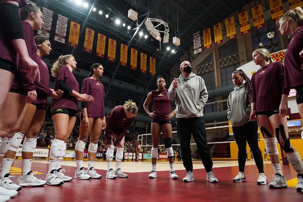The announcement that Hugh McCutcheon, center, will leave the Gophers volleyball team at the end of the season will create a crucial search for Minnes