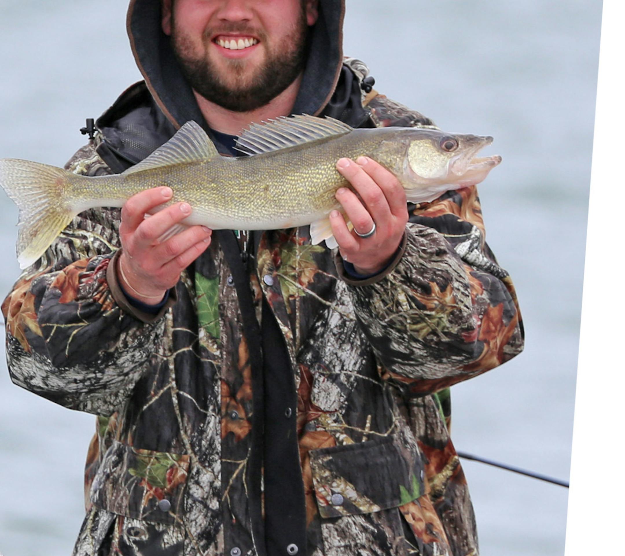 Tyler Manthey of St. Michael was all smiles Saturday morning while catching walleyes on Leech Lake.
