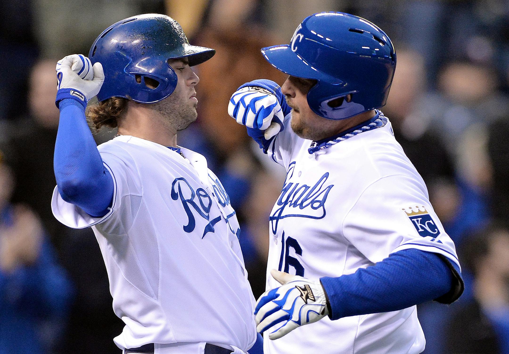 Kansas City Royals designated hitter Billy Butler (16) is congratulated by Mike Moustakas (8) after hitting a solo home run in the first inning against the Minnesota Twins on Wednesday, April 10, 2013, at Kauffman Stadium in Kansas City, Missouri. (John Sleezer/Kansas City Star/MCT)