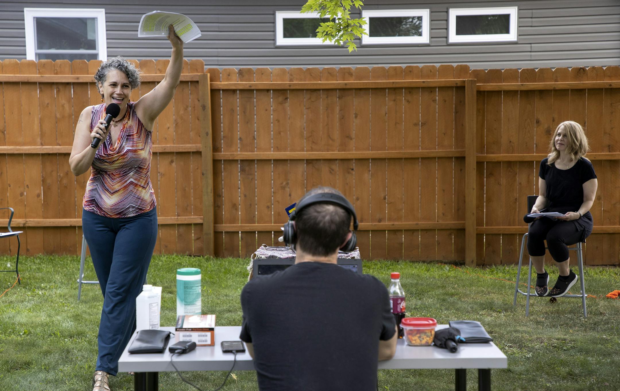 Actors Laura Stearns and Kim Kivens along with stage manager Samson Perry (middle) rehearsed a play in a south Minneapolis backyard. The a two-woman show is being put on by the Minnesota Jewish Theatre that will play in various parks and yards in the Twin Cities. ] CARLOS GONZALEZ • cgonzalez@startribune.com – Minneapolis, MN – August 6, 2020, Minnesota Jewish Theatre has announced a mixed season -- outdoor, online, maybe indoor in the spring -- starting 8/15 with a two-woman show that will play