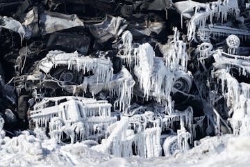 The fire at Northern Metal Recycling in Becker burned for days but was largely under control — and under ice — Thursday morning.