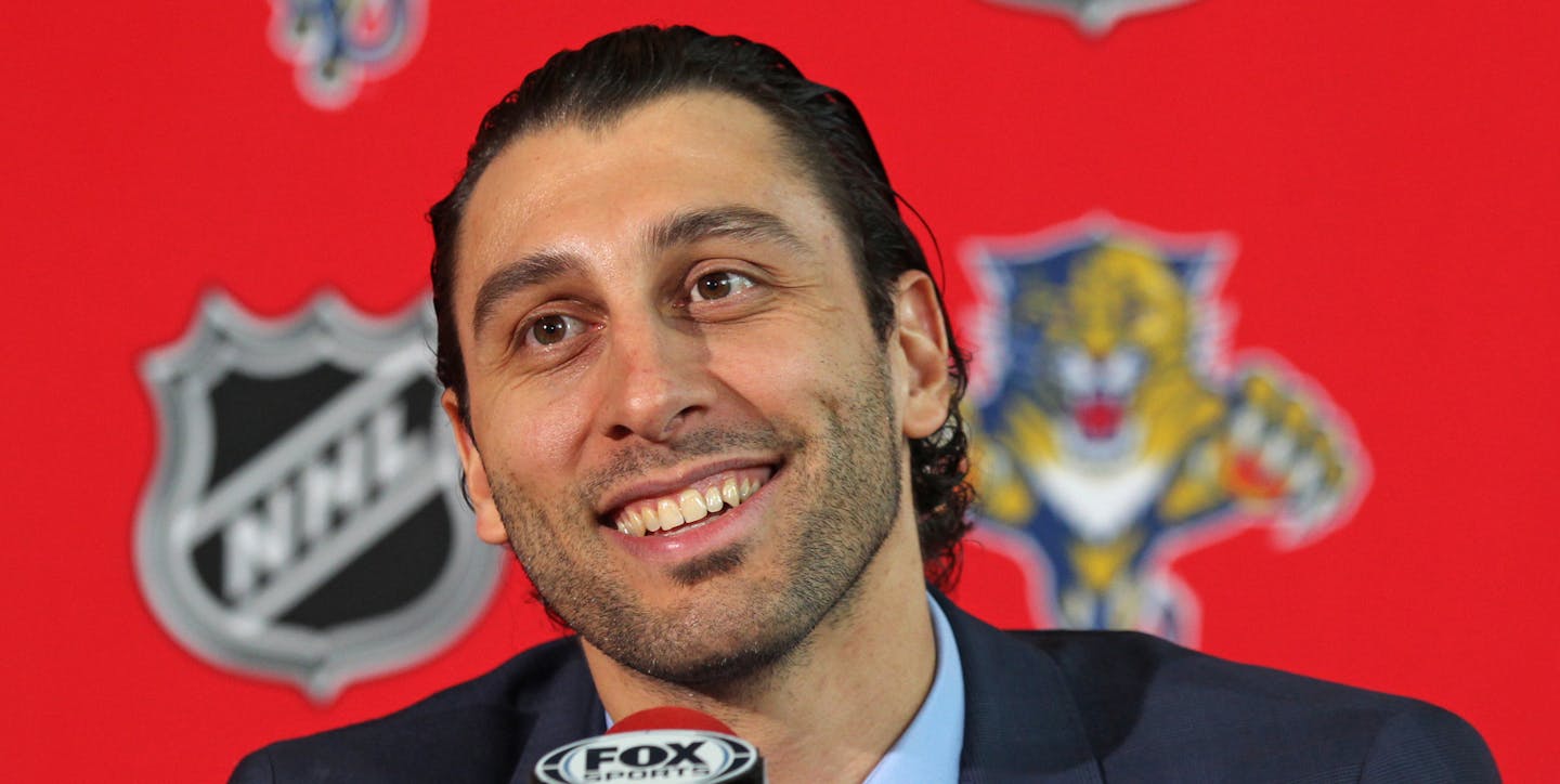 Florida Panthers goalie Roberto Luongo smiles during a news conference Wednesday, March 5, 2014, in Sunrise, Fla. After nearly eight years apart, Luongo was the centerpiece of a four-player trade between Florida and the Vancouver Canucks on Tuesday. The Panthers sent goalie Jacob Markstrom--once considered their future in net--and forward Shawn Matthias to the Canucks for Luongo and forward Steven Anthony. (AP Photo/The Miami Herald, Al Diaz) MAGS OUT