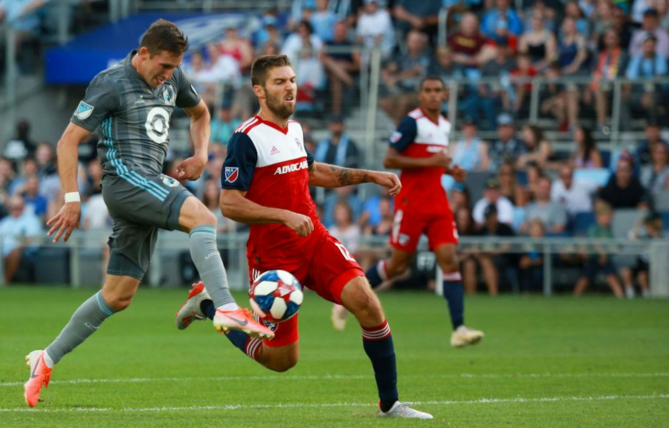 Ethan Finlay (13) hits a shot in stride in the first half. ALEX KORMANN ¥ alex.kormann@startribune.com The Minnesota United FC took on FC Dalls on Saturday July 13, 2019 at Allianz Field in St. Paul, MN.