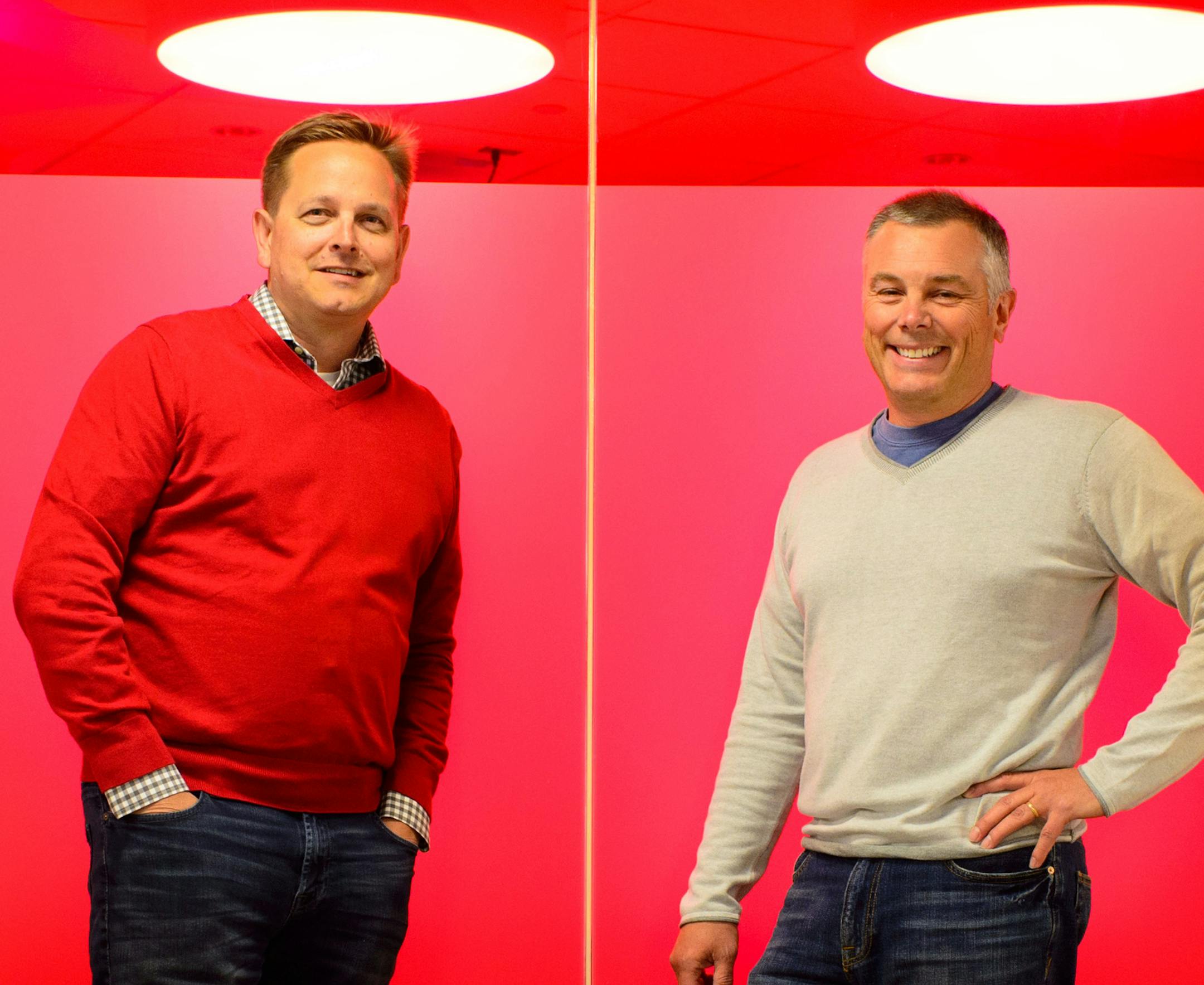 Sportradar US co-founders Rob Pythian and Dave Abbott in the company's new Minneapolis headquarters. ] GLEN STUBBE * gstubbe@startribune.com Tuesday, April 21, 2015 Sportradar US has just signed a big deal with the NFL to collect and distribute stats for the league. EDS, L to R, red is their company color fyi