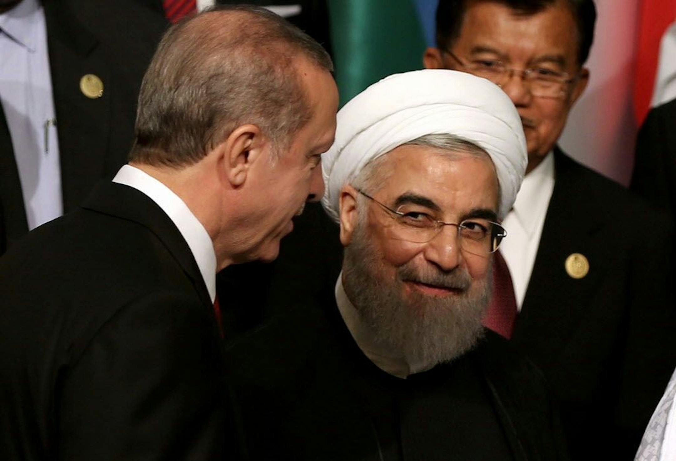 Turkey's President Recep Tayyip Erdogan, left, and Iran's President Hassan Rouhani are seen before the leaders and representatives of the Islamic countries gather for the 13th Organization of Islamic Cooperation, OIC, Summit in Istanbul, Thursday, April 14, 2016.
