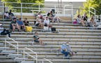 The crowd sat in the stands for the East Ridge vs. Mounds View boys soccer game. Groups were distanced from each other, with some wearing masks and so