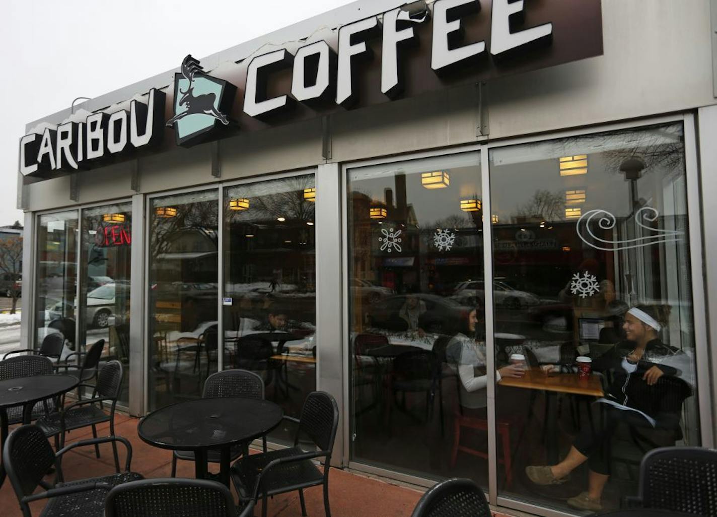 At the Caribou on Grand near Dale in St. Paul, regular customers Aubree Neuville and Hannah Bilodeau, right, enjoyed their coffee drinks. rtsong-taatarii@startribune.com