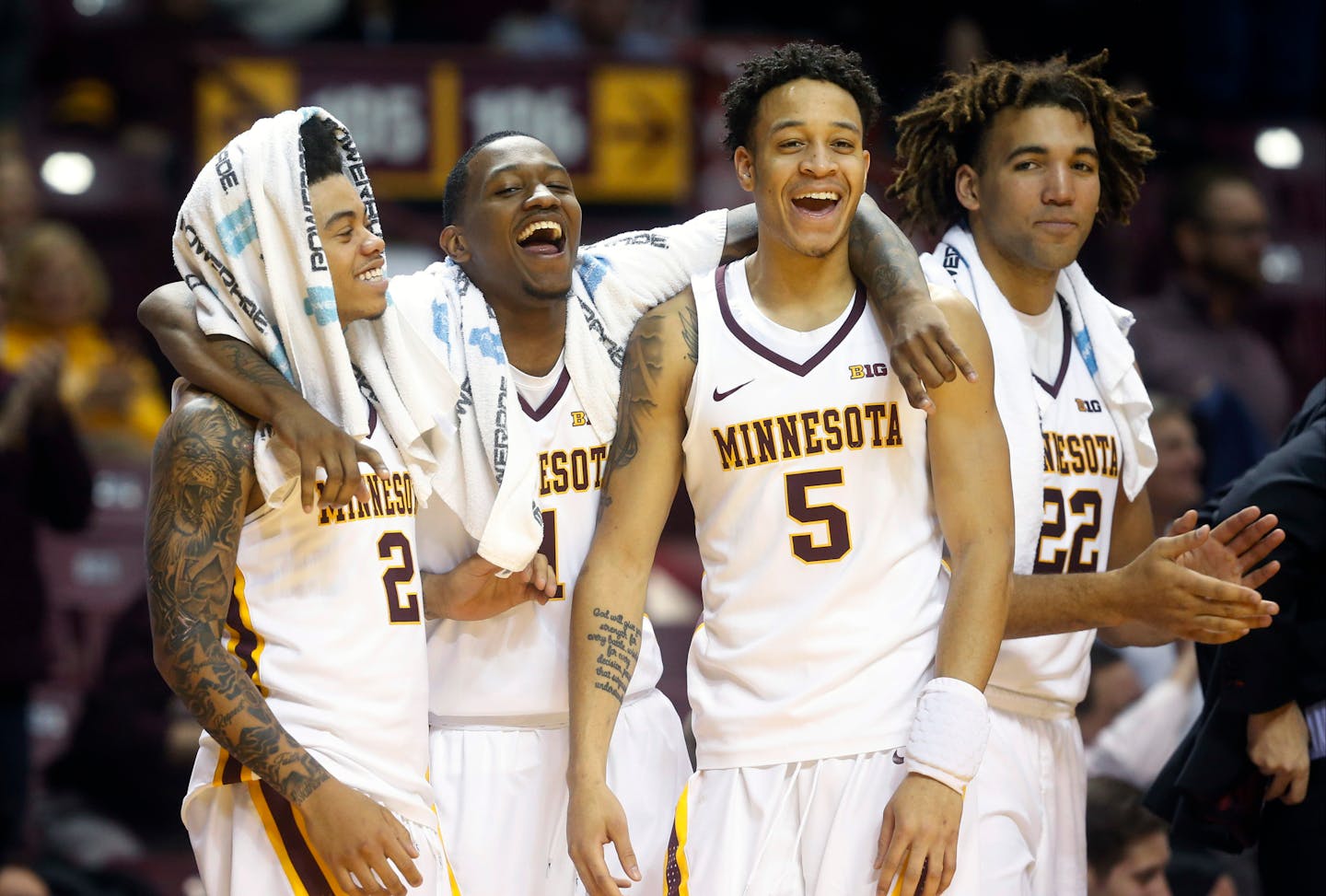 From left, Nate Mason, Dupree McBrayer, Amir Coffey and Reggie Lynch