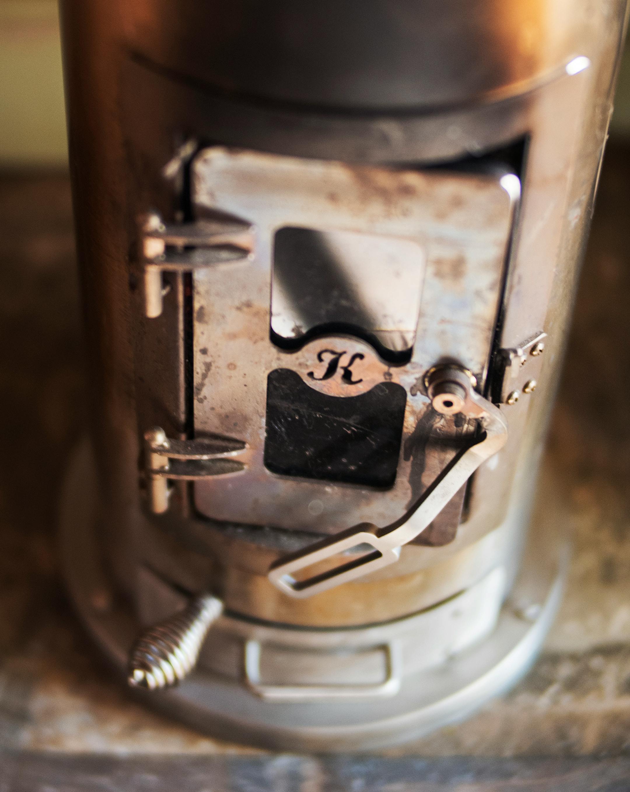 A small wood stove heats the house.