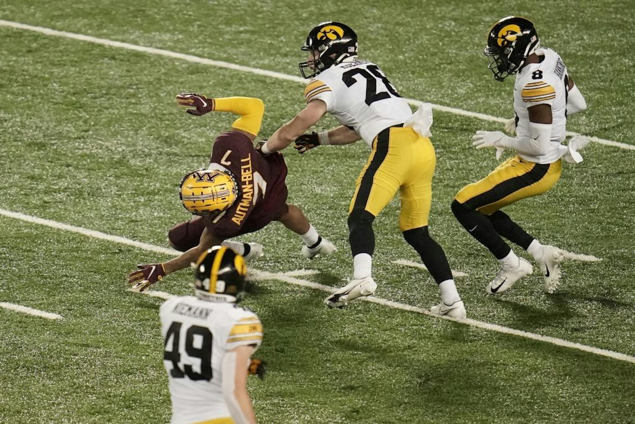 Iowa Hawkeyes defensive back Jack Koerner (28) broke up a pass intended for Minnesota Gophers wide receiver Chris Autman-Bell (7) in the second quarter. It was called as a targeting penalty but overturned.