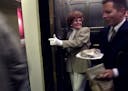 Minneapolis, Mn., Thurs., Jan. 3, 2002--Elevator operator Millie DeZiel will continue to wear her white gloves even though another elevator in the You