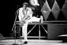 FILE - In this Oct. 17, 1986 file photo, Chuck Berry performs during a concert celebration for his 60th birthday at the Fox Theatre in St. Louis, Mo. 