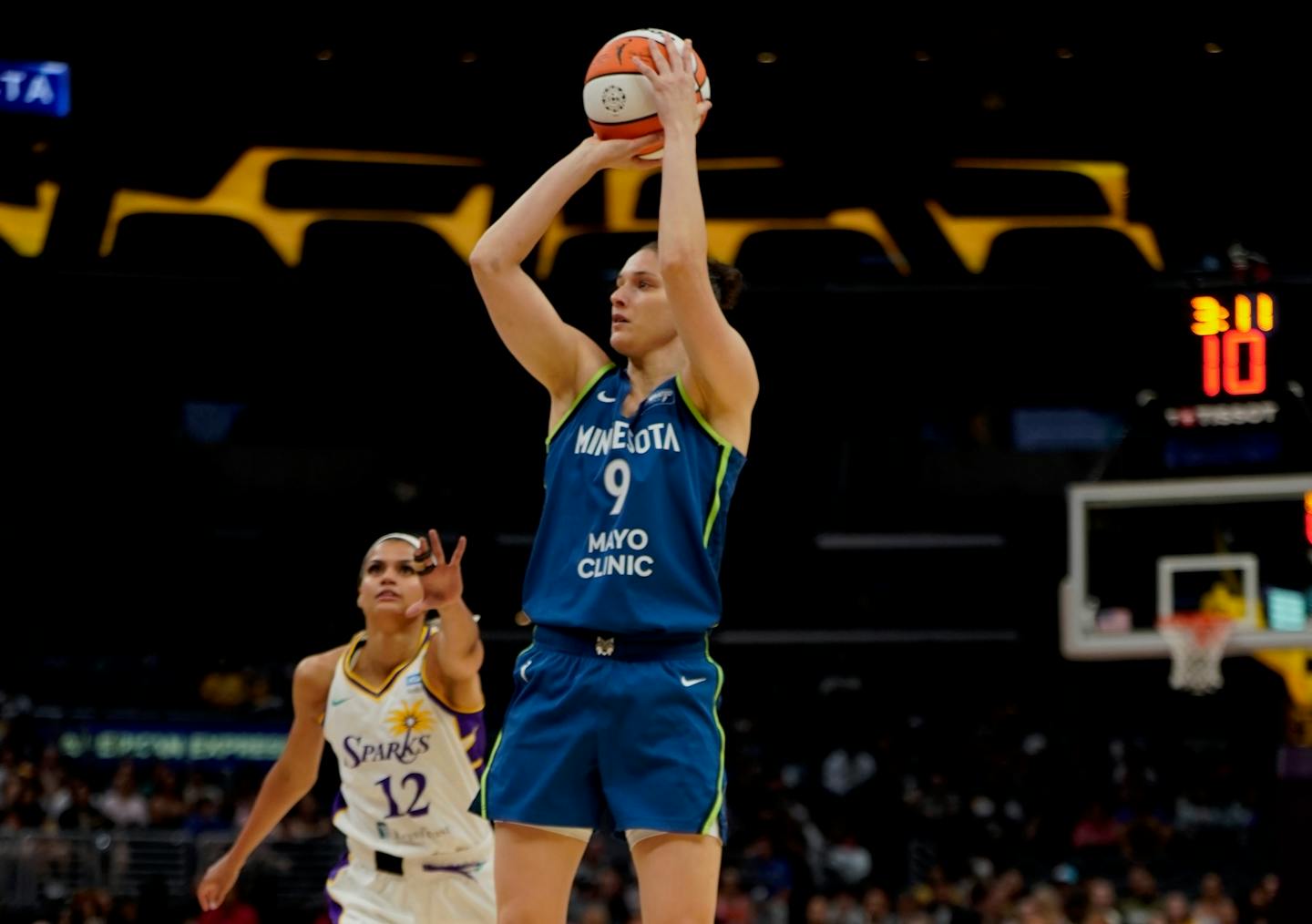 The Lynx's Cecilia Zandalasini, who scored 11 points off the bench, goes up for a shot against the Sparks on Tuesday night in Los Angeles.