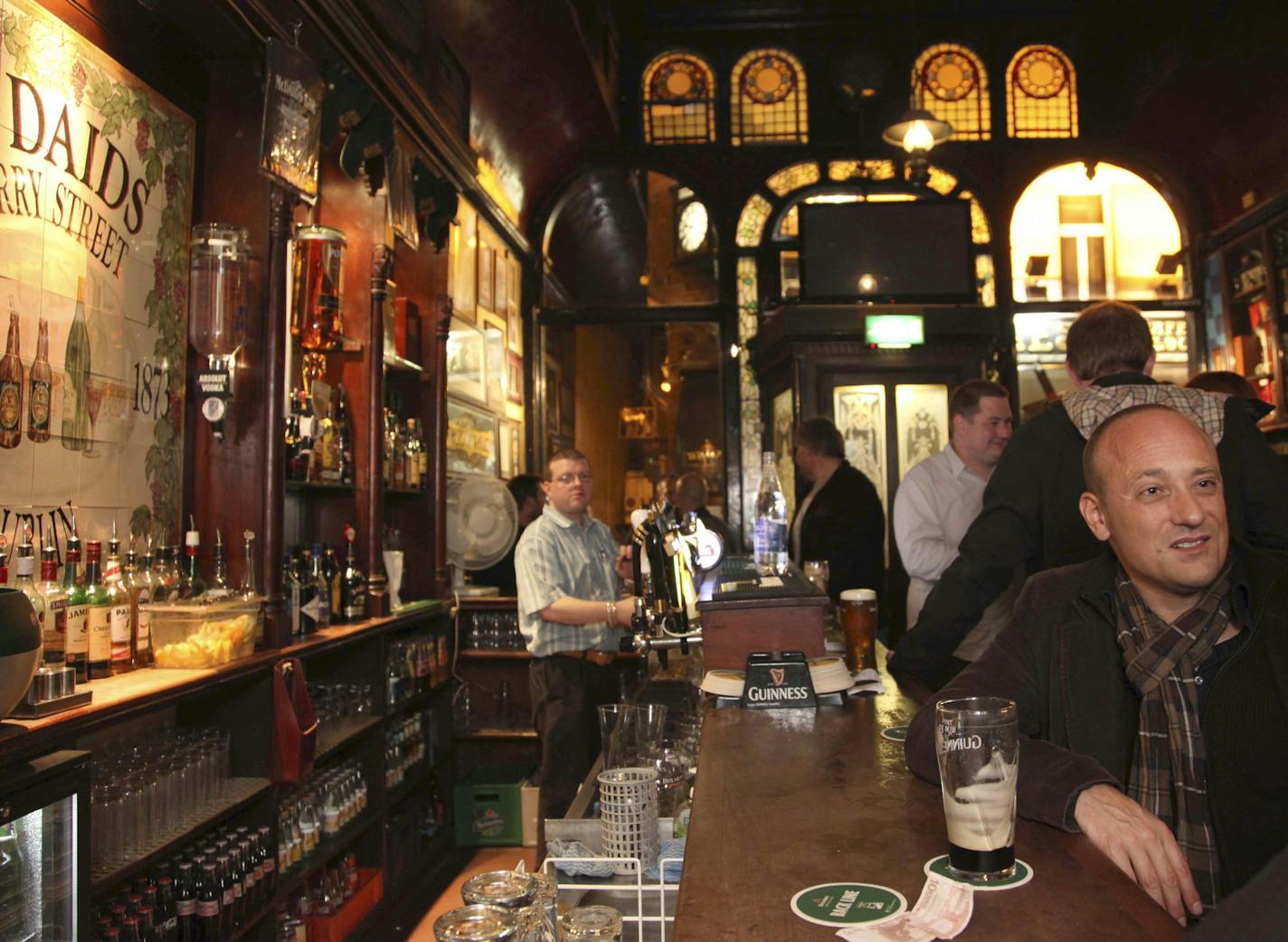 Patrons in McDaids pub in Dublin, Oct. 9, 2012. Visitors to Ireland can expect spectacular scenery, bountiful seafood and an infinity of pubs. (Derek Speirs/The New York Times) -- PHOTO MOVED IN ADVANCE AND NOT FOR USE - ONLINE OR IN PRINT - BEFORE OCT. 28, 2012. -- ORG XMIT: XNYT69