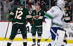 Kirill Kaprizov, center, became only the second Wild player to post four points in a period when he helped ignite the Wild’s third-period rally agai