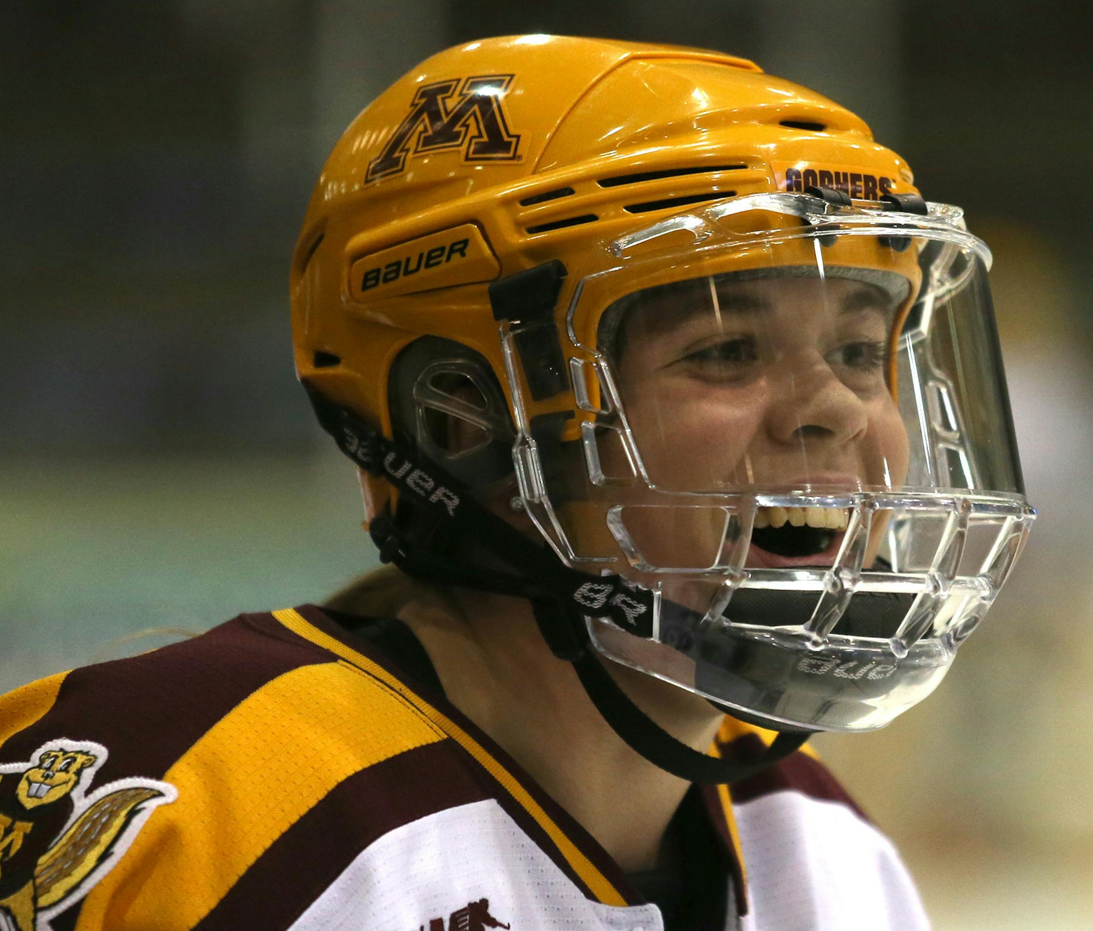 Gopher Hannah Brandt smiling before the game as she talked to teammates ] (KYNDELL HARKNESS/STAR TRIBUNE) kyndell.harkness@startribune.com Gopher women's hockey played Boston University in the quarterfinals of the NCAA championship at Ridder Arena in Minneapolis, Min, Saturday March 15, 2014. Gophers won over Boston University 5-1.