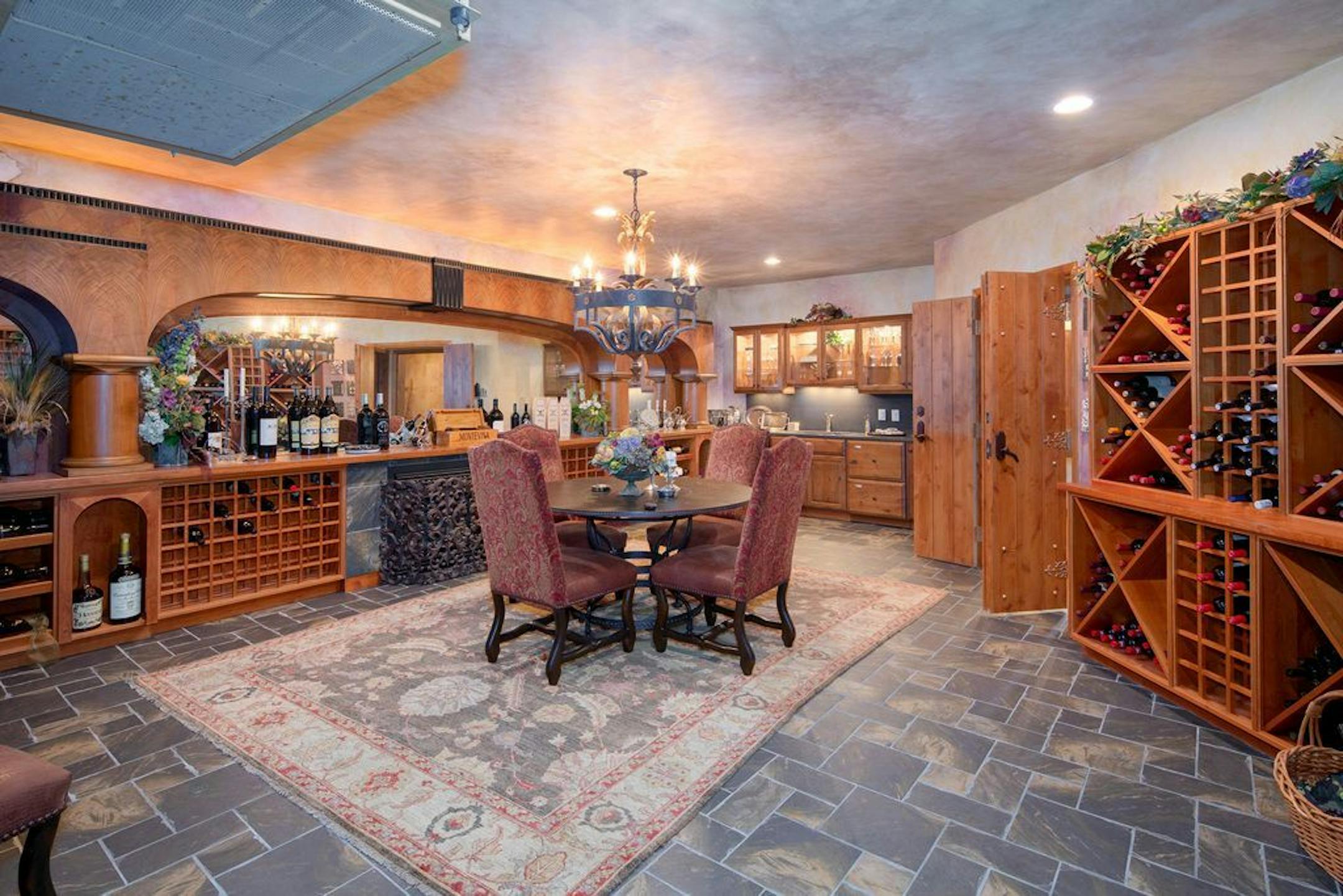 The wine room is large enough for entertaining.