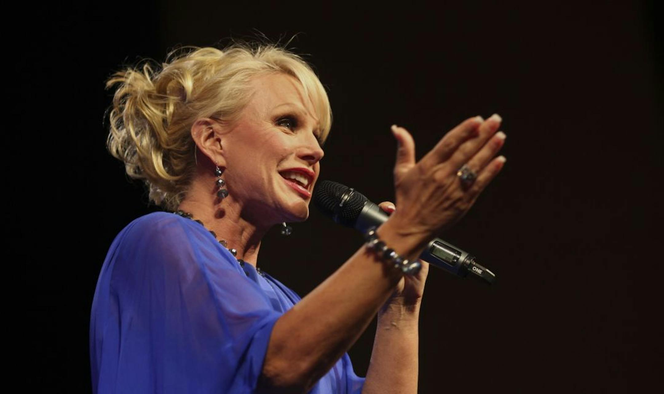 Karen Sorbo, charity fundraising auctioneer, tried to coax more money out of the room during The Pacer Center's annual event at the Minneapolis Convention Center in Minneapolis, Min., Saturday, May 5, 2012.