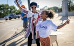 U.S. Rep. Ilhan Omar's youngest daughter, Ilwad Hirsi, 10, joined her mother during a voter engagement event on the corner of Broadway and Central Ave