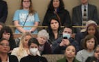 People listen to testimony during a hearing about codifying abortion protections before the House Health and Human Services Finance Committee.