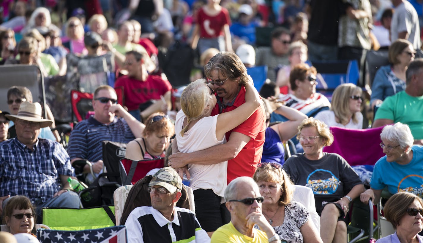 Tim and Laura Vogel slowed danced to a song during a performance by the Johnny Holm Band at Summertime by George on June 13, 2018, in St. Cloud, Minn.